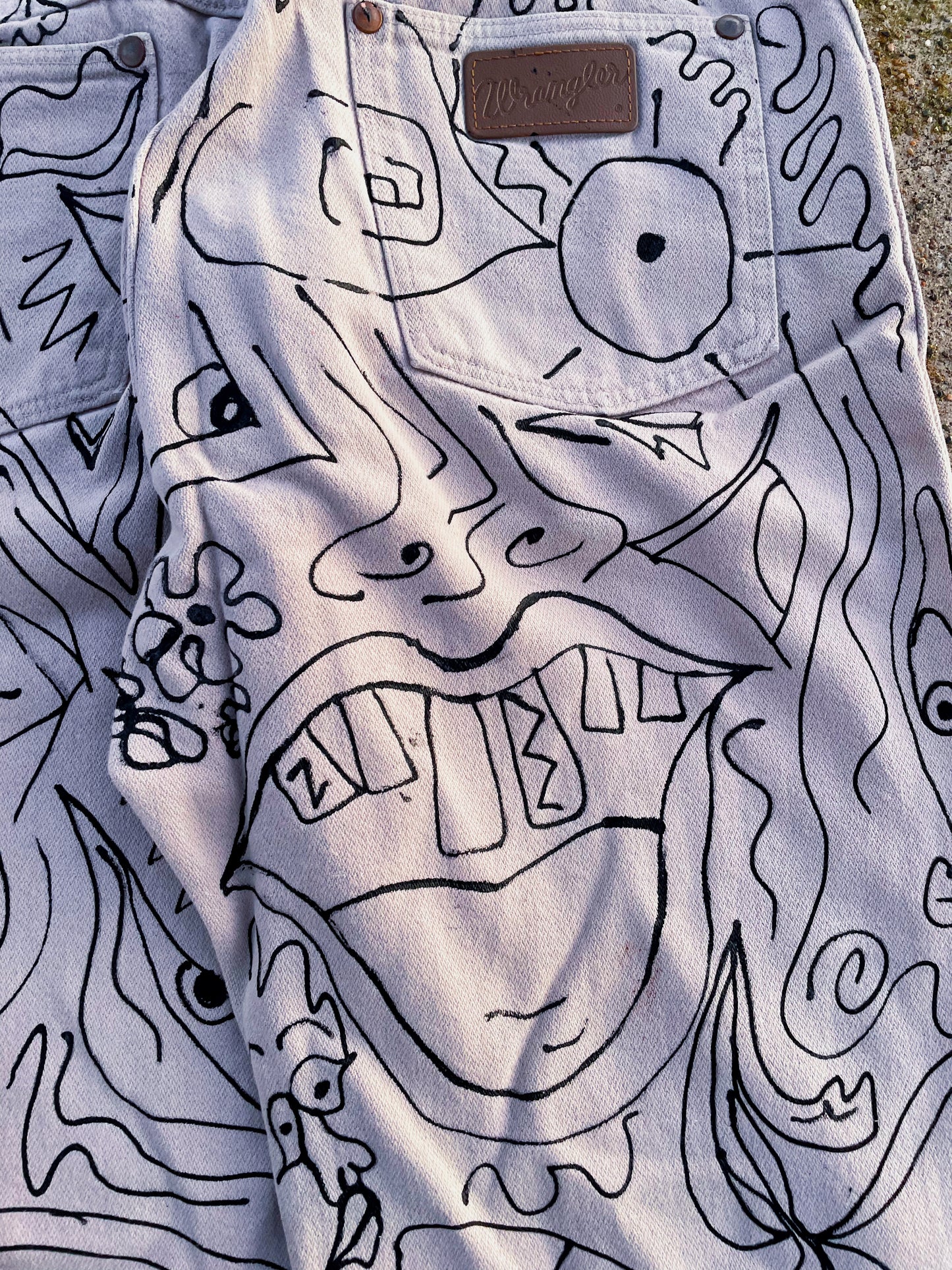 “Monochrome Mayhem: The Doodle Dream Jeans”