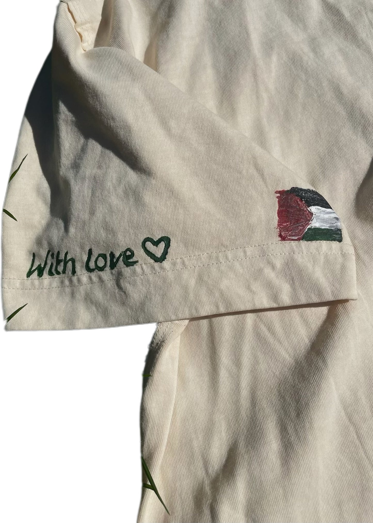 Hand-Painted T-Shirt – “Dancing Olive Trees of Resistance”