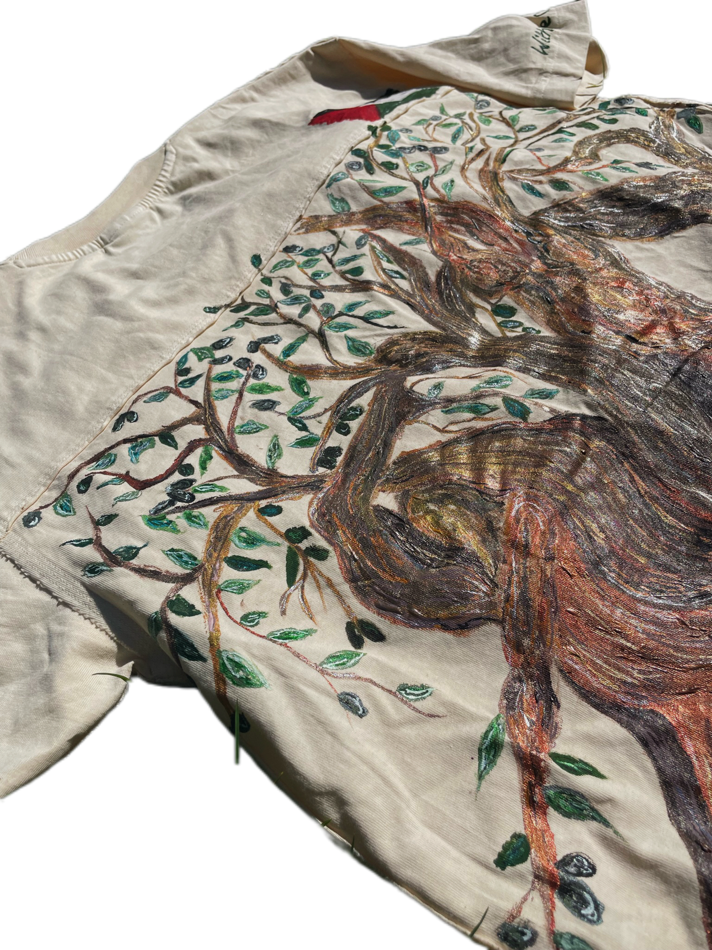 Hand-Painted T-Shirt – “Dancing Olive Trees of Resistance”